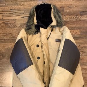 Coat was worn only once. Excellent condition but does have one button missing.